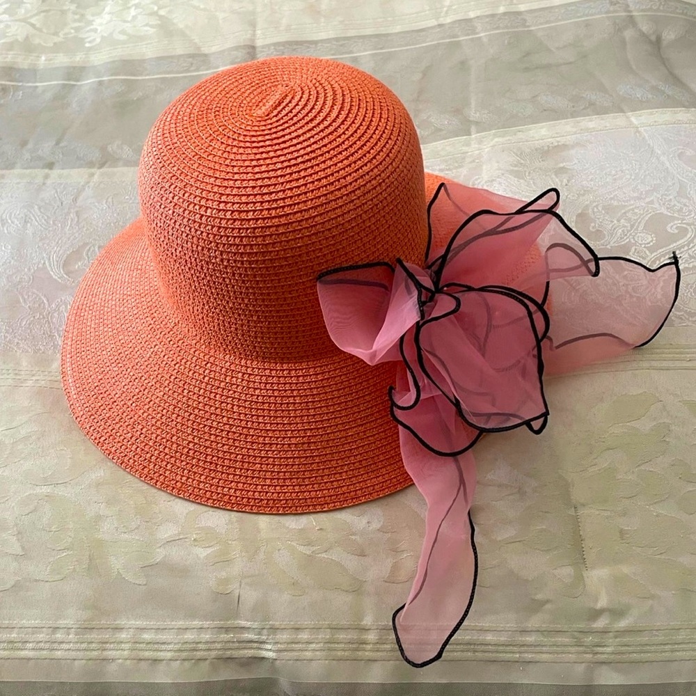 Ladies wide brimmed hat with ribbon